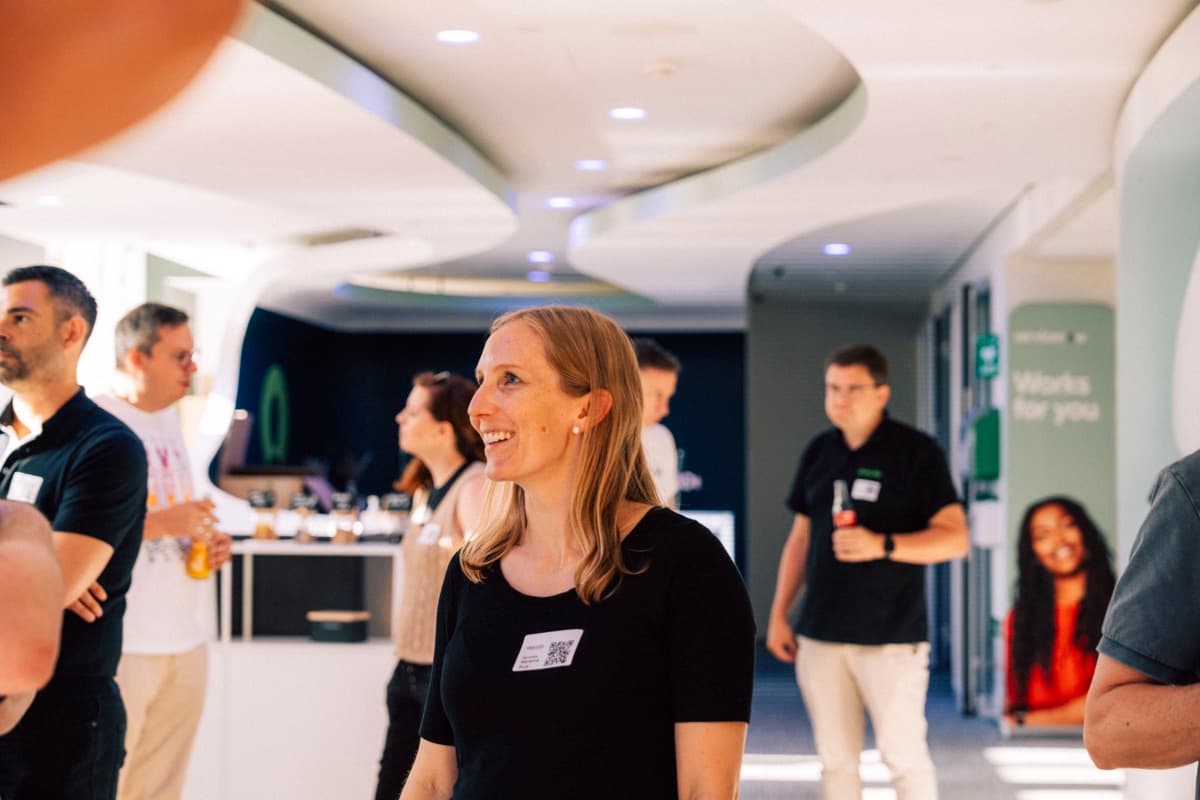 A community member laughing during a live event